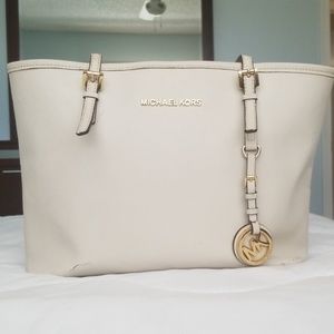 White and gold MK tote bag